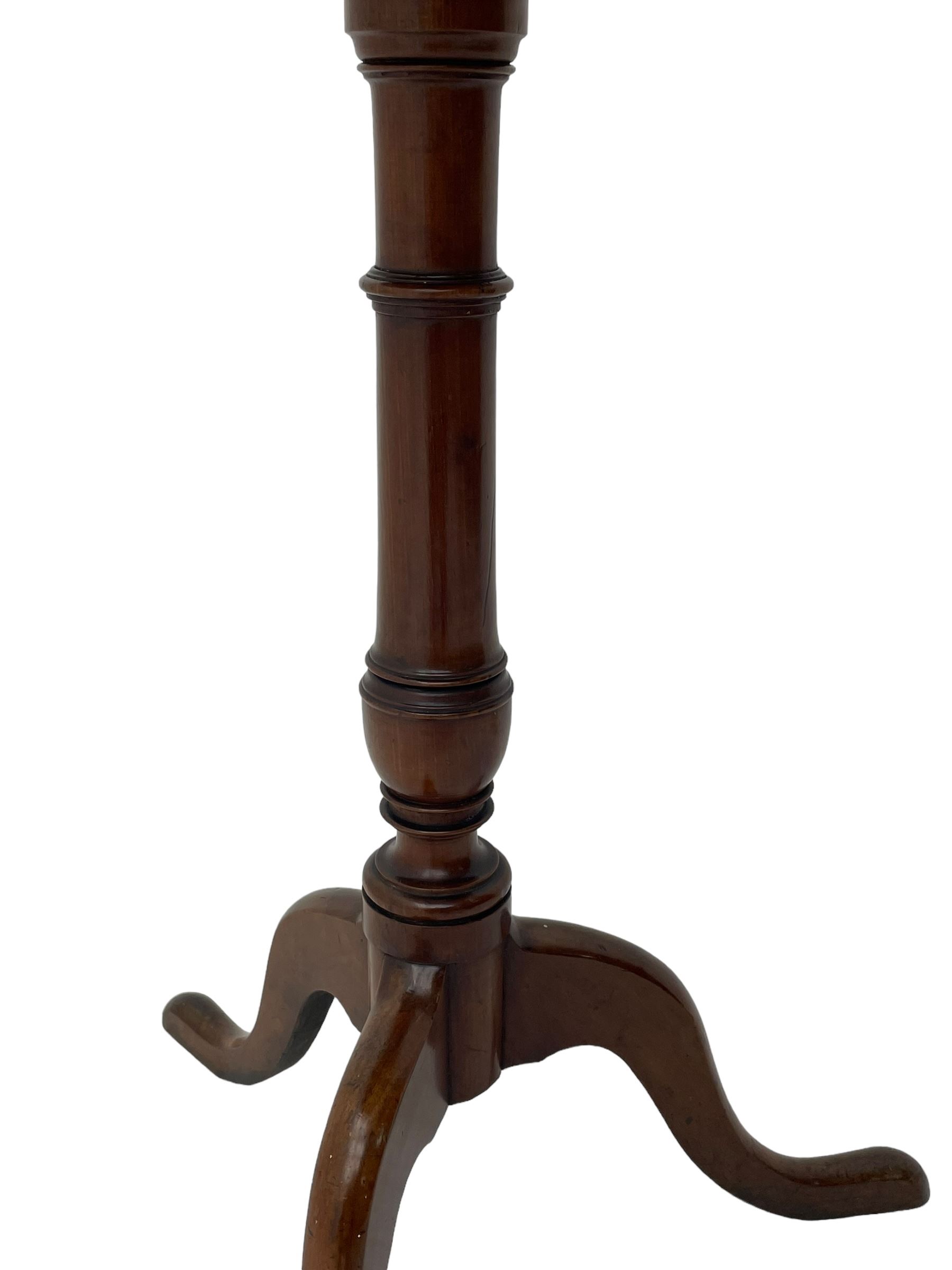 George III mahogany tripod table, circular moulded dished tilt-top, ring turned stem on three splayed supports 