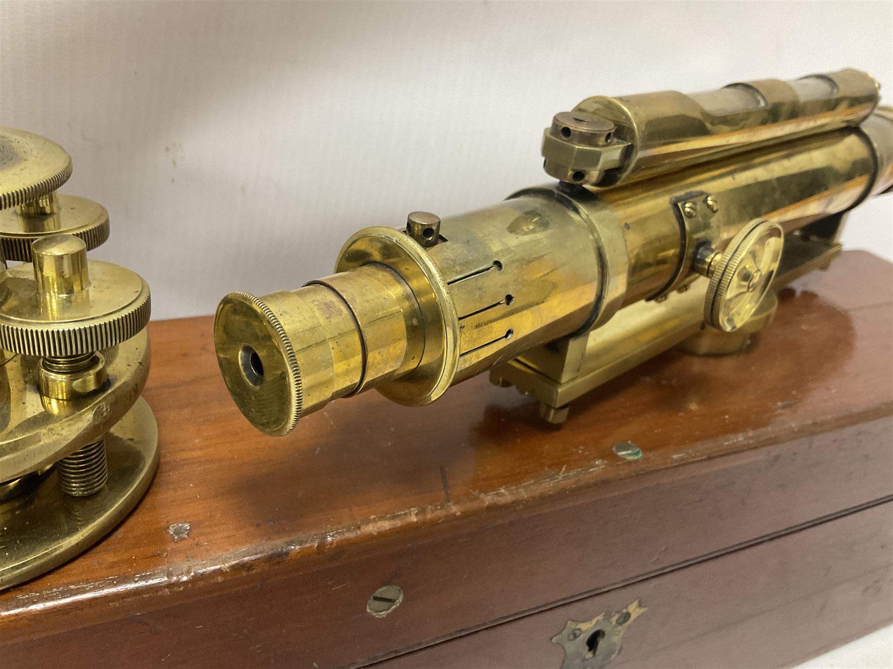 Late 19th century/early 20th century brass dumpy level, inscribed Carter Optician Exeter, in fitted mahogany case, together with a Lowne Instruments Air Meter, no L 3854