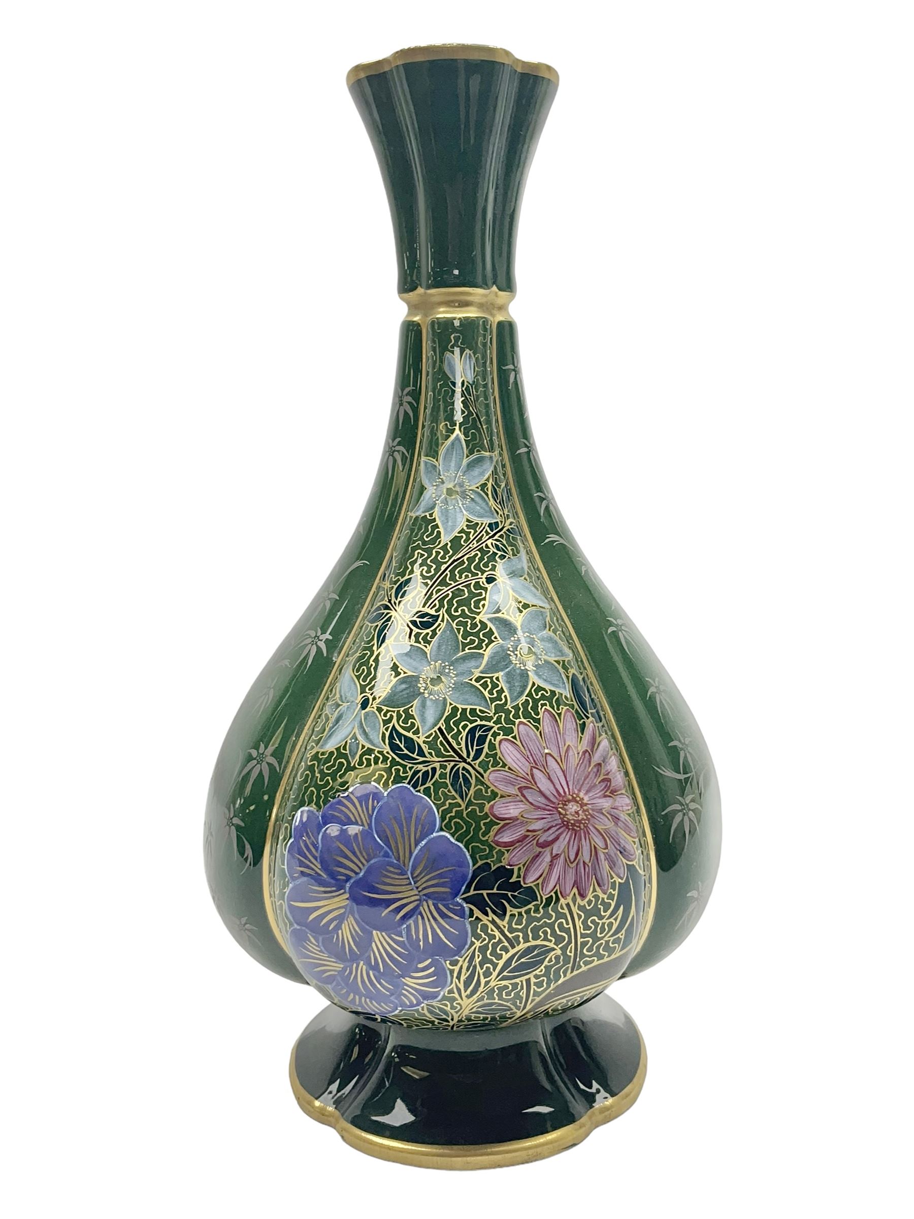 Royal Worcester vase of baluster form with floral decoration on a green ground H26cm