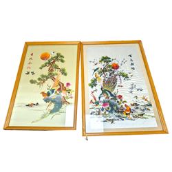 Two mid century Chinese embroidered silk panels, in wooden frames 