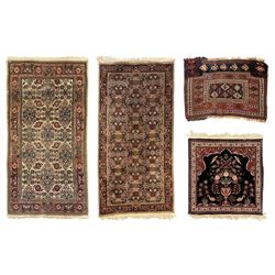 Persian-style wool rug, cream field with floral and geometric motifs, wide floral border (...