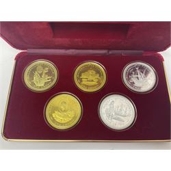 Queen Elizabeth II Isle of Man 1980 'Commemorating the 1980 Olympics' silver proof crown four coin set and 1979 '1000th Anniversary of Tynwald' silver proof crown five coin set, both sets cased with certificates 