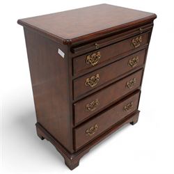 Small Georgian design walnut chest, rectangular moulded top with crossbanding and feather bands, shaped canted corners, slide over four graduating cock-beaded drawers, pierced brass handle plates, on bracket feet 