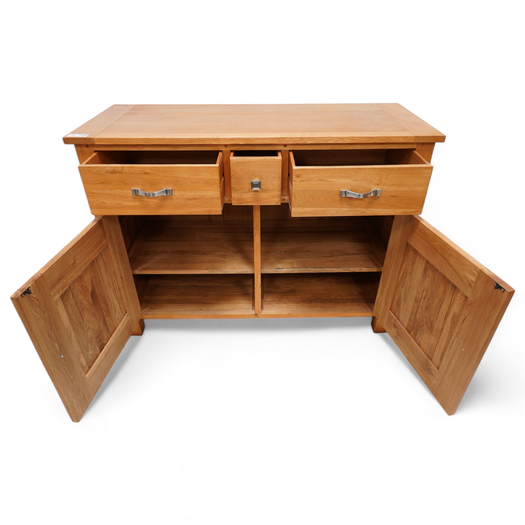 Light oak sideboard, fitted with three drawers and two cupboards