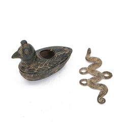 Small iron oil lamp, modelled as a bird with carved foliate and geometric detail throughou...