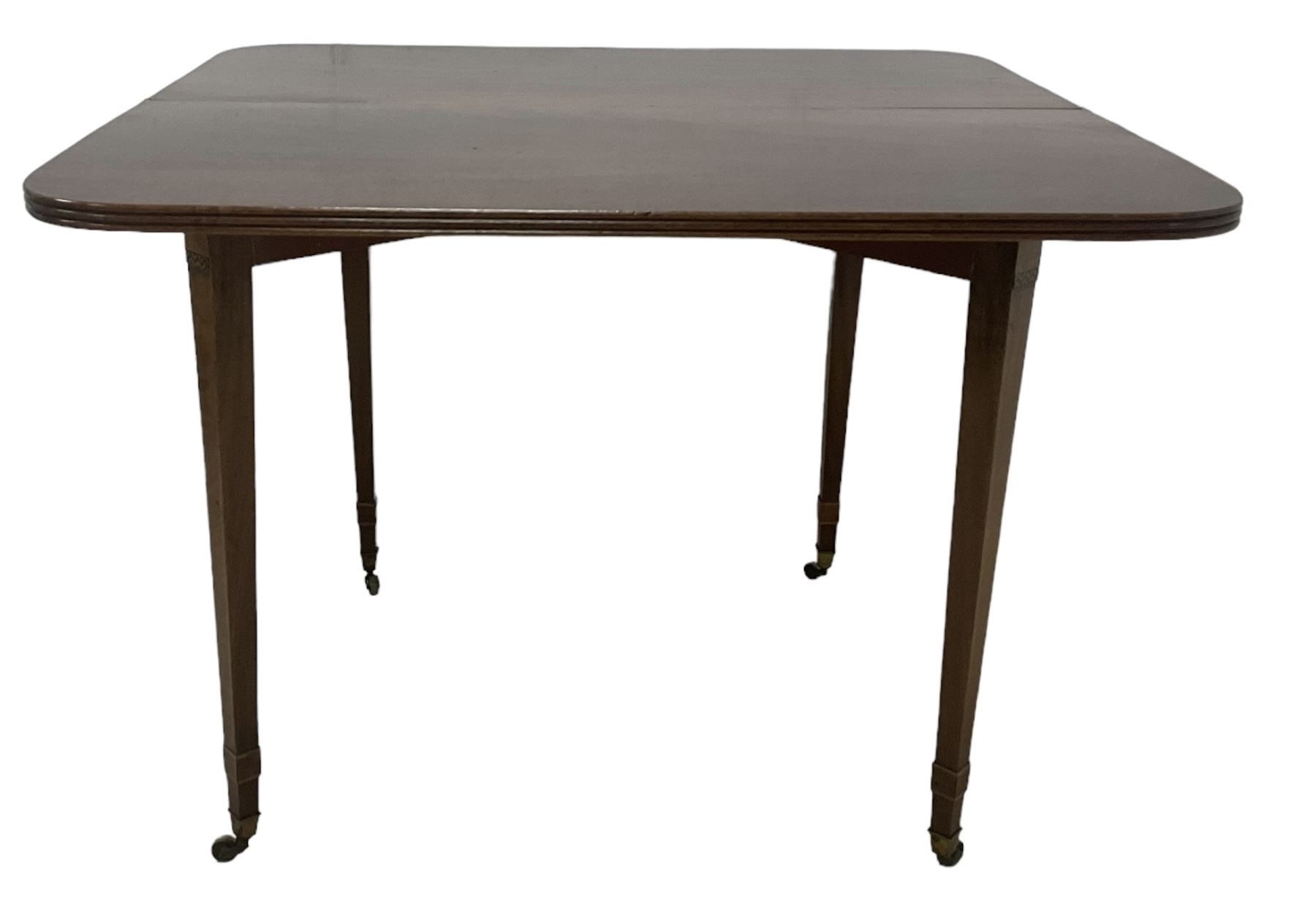 19th century mahogany tea table, fold-over top with reeded edge over inlaid frieze, on double gate-leg action square tapering supports, with brass castors