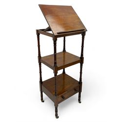 Regency mahogany etagere, the hinged and adjustable top over two tiers and single drawer, turned supports on brass cups and castors 