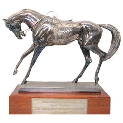 'The Freestone Stanley Lincoln Handicap Trophy, Doncaster Racecourse March 22nd 2003' - Silver filled model of a racehorse H32cm x W42cm on a mahogany plinth with silver plaque Sheffield 2003 Maker Laurence R Watson & Co.