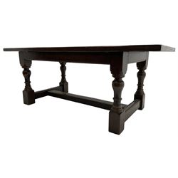 20th century oak refectory dining table, rectangular cleated top on turned supports joined by H-stretcher