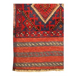 Pashtun Meshwani ground runner, central field decorated with rows of multicoloured diamond medallions, surrounded by geometric motifs, wide red and blue striped border with additional guard bands