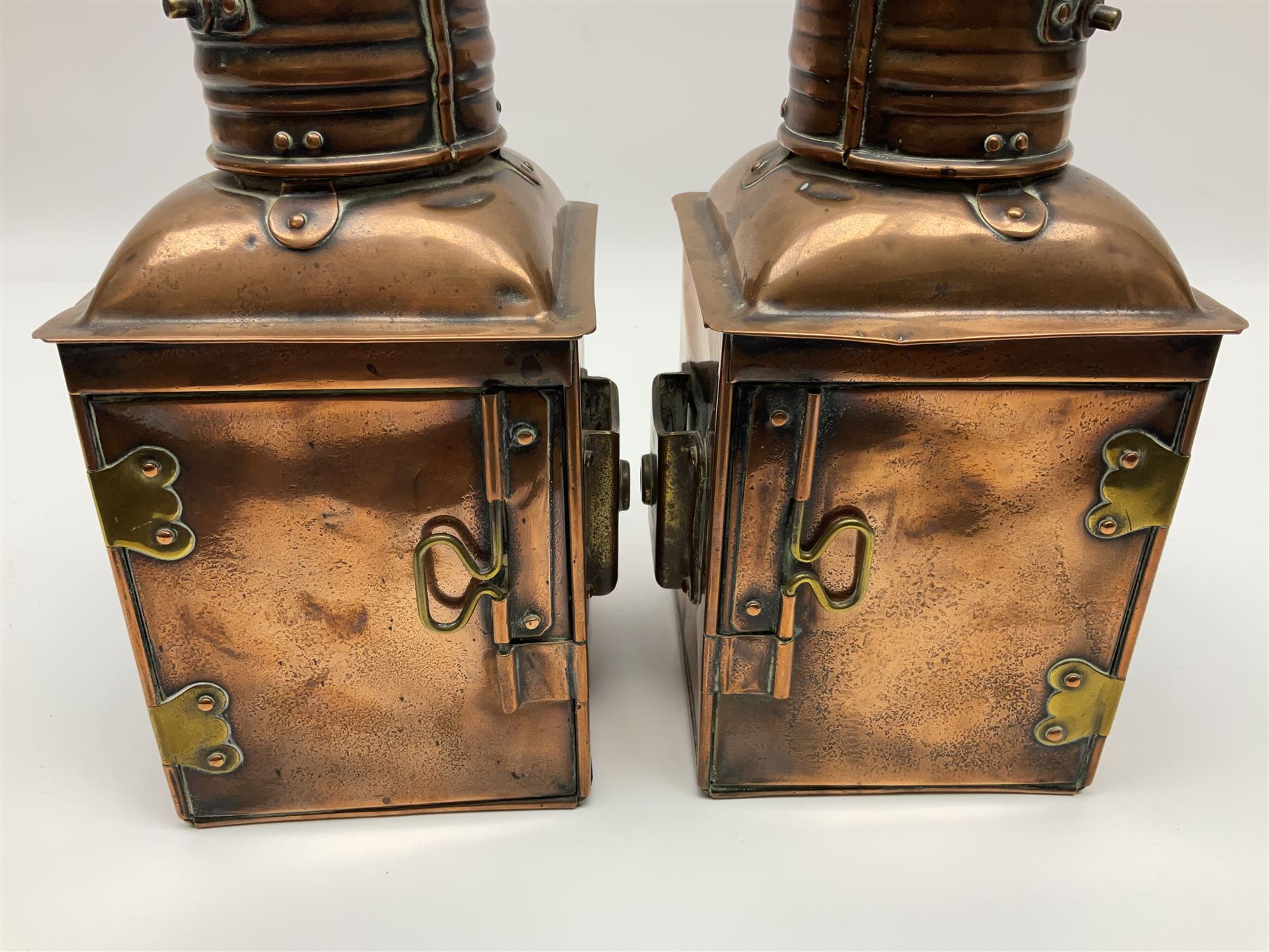 Pair of ‘Starboard’ and ‘Port’ copper ship lamps, of bow-fronted triangular form, H21cm