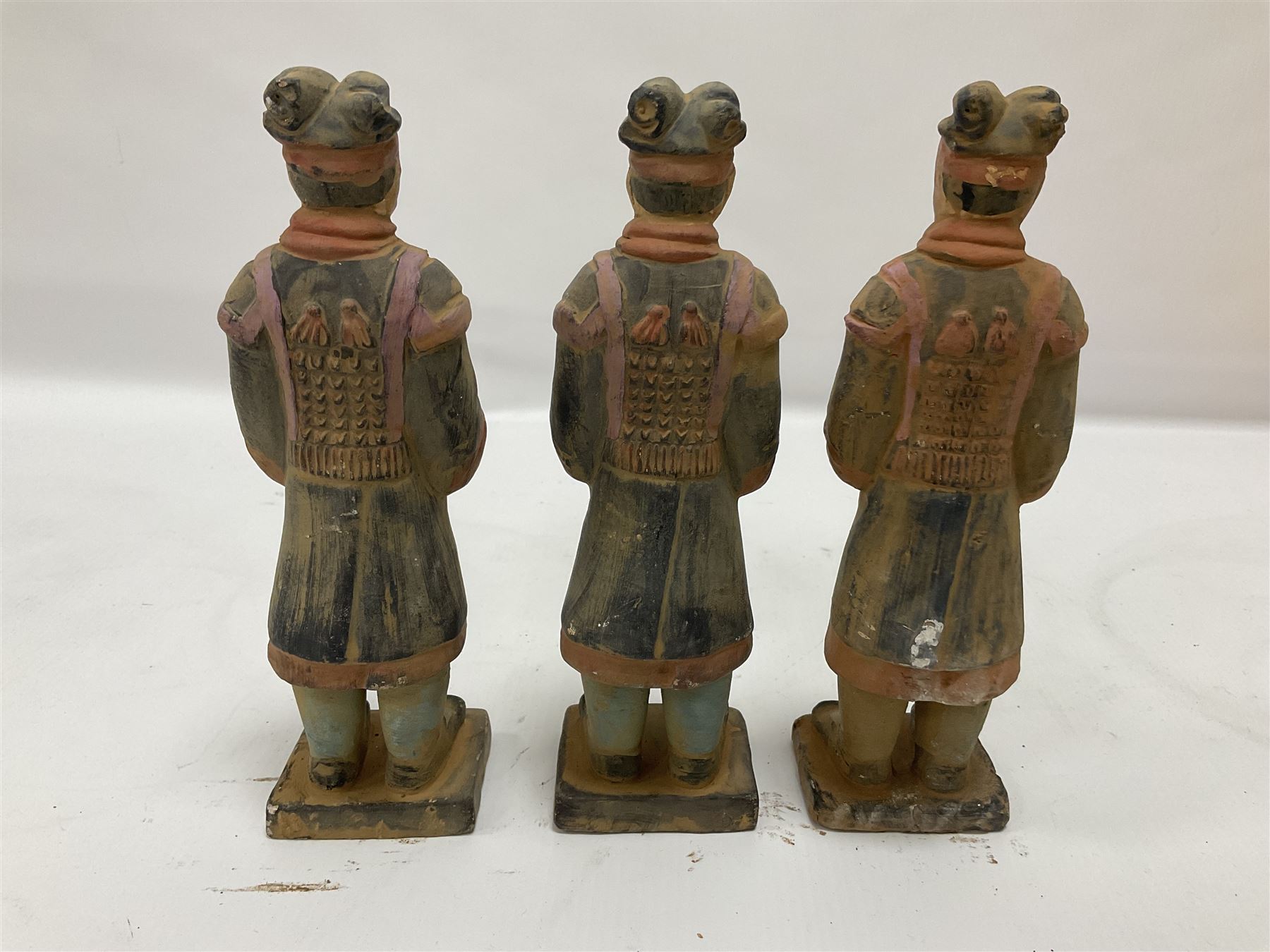 Set of three painted Chinese 'Terracotta Warrior' style figures, H20cm