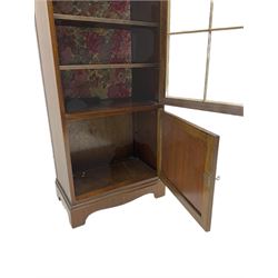Mid-20th century walnut glazed bookcase, fitted with two cupboards