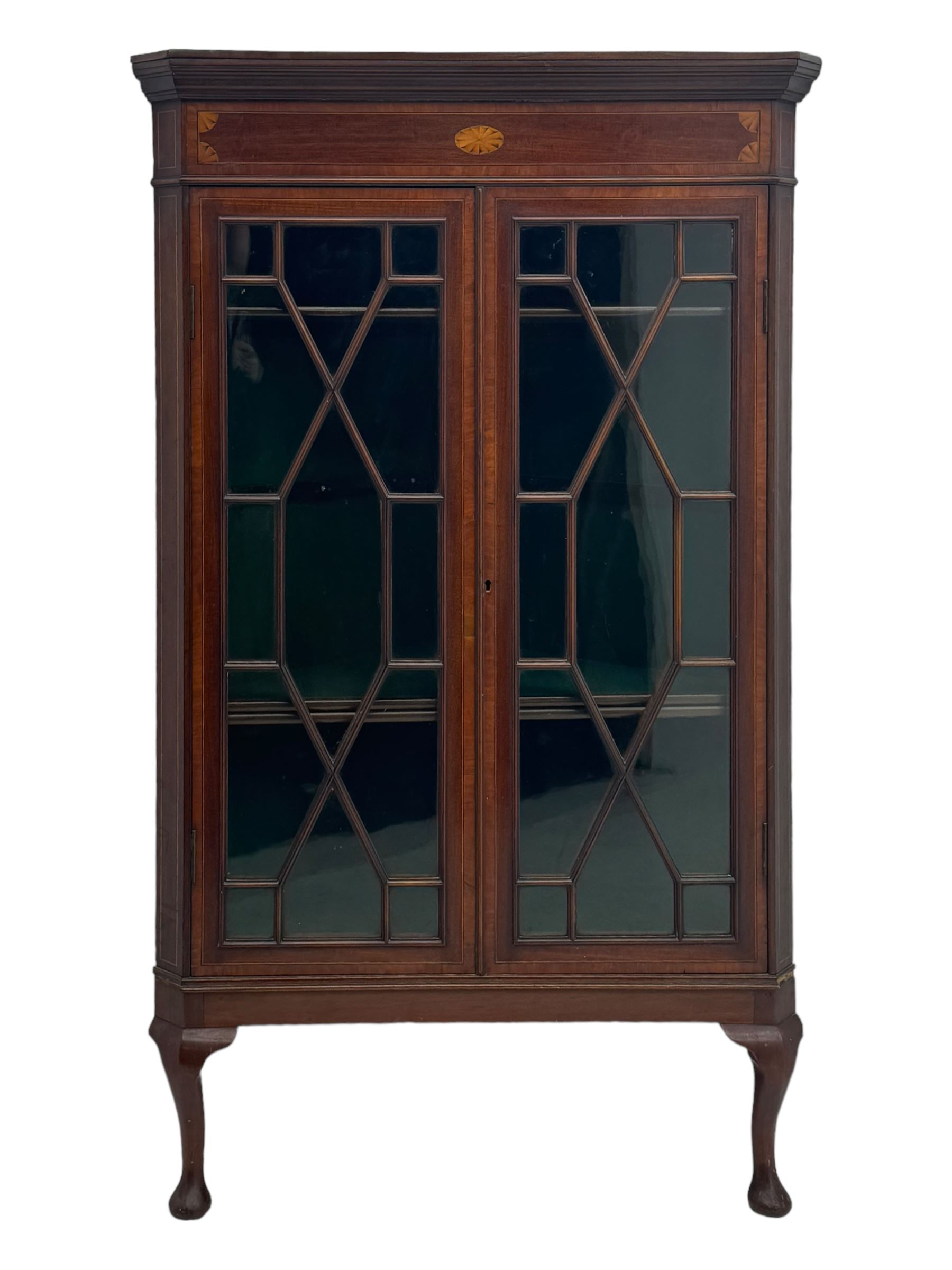 Edwardian mahogany corner cabinet, projecting cornice over inlaid frieze, two astragal glazed doors enclosing shelved interior, on cabriole supports