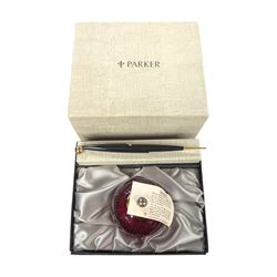 Whitefriars for Parker Pens red glass paperweight with bubble inclusions, in presentation ...