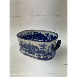 Pair of Victorian style blue and white footbaths, each with twin lug handles and transfer print decorated with city scape, H14cm