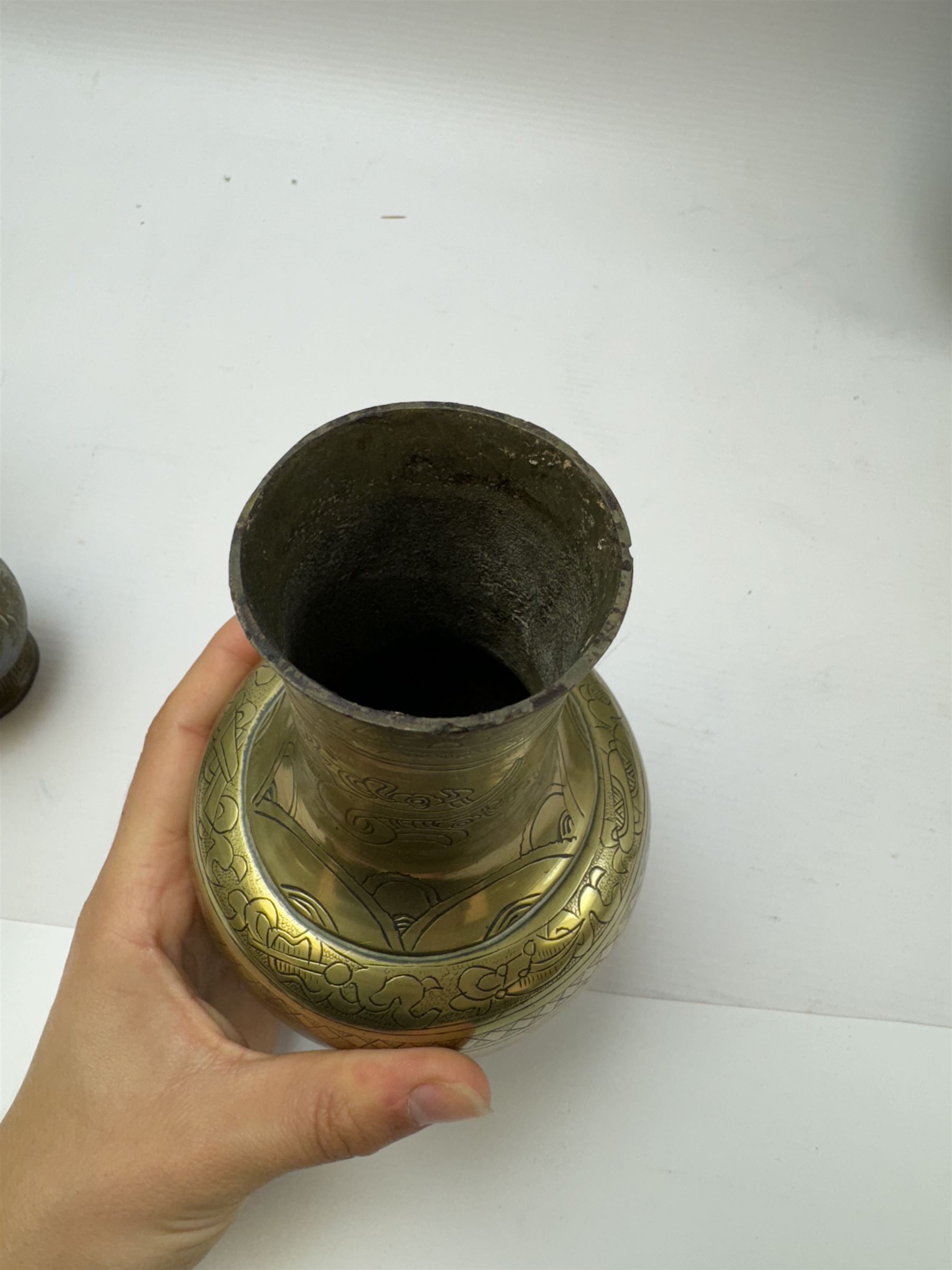 Pair of brass vases, together with brass charger and other metalware 