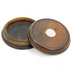 19th century French pressed horn circular box, the cover with a geometric design D6.5cm  and one other horn box with mother of pearl roundel (2)