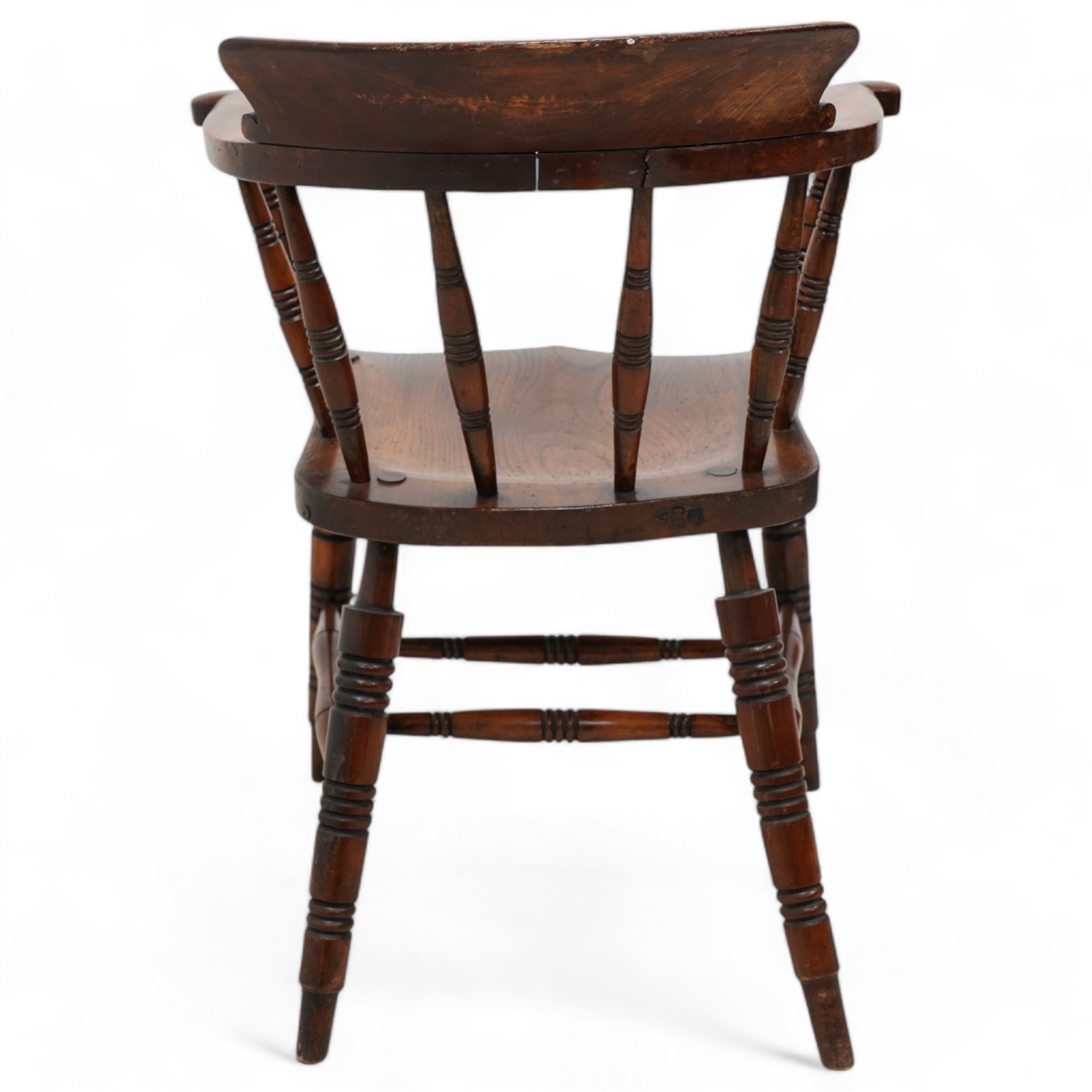 19th century elm and beech Captain's chair, curved back and arms over spindle supports, dished seat on turned supports united by double H-stretcher 