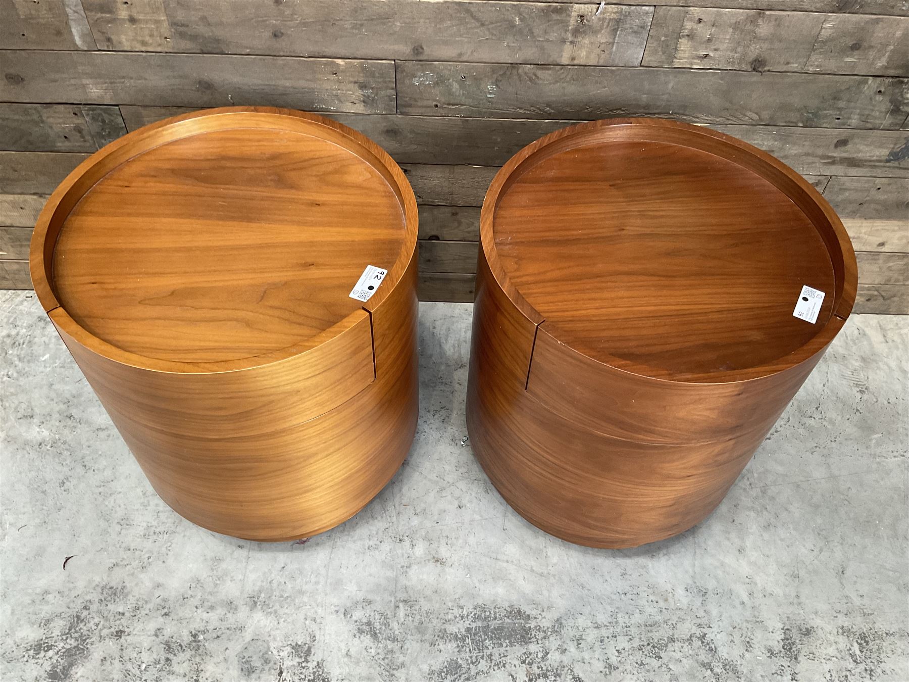 Pair of walnut circular barrel shaped lamp tables, fitted with single drawer