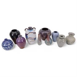 Collection of studio pottery, including twin handled bottle shaped base, blue and pink spe...