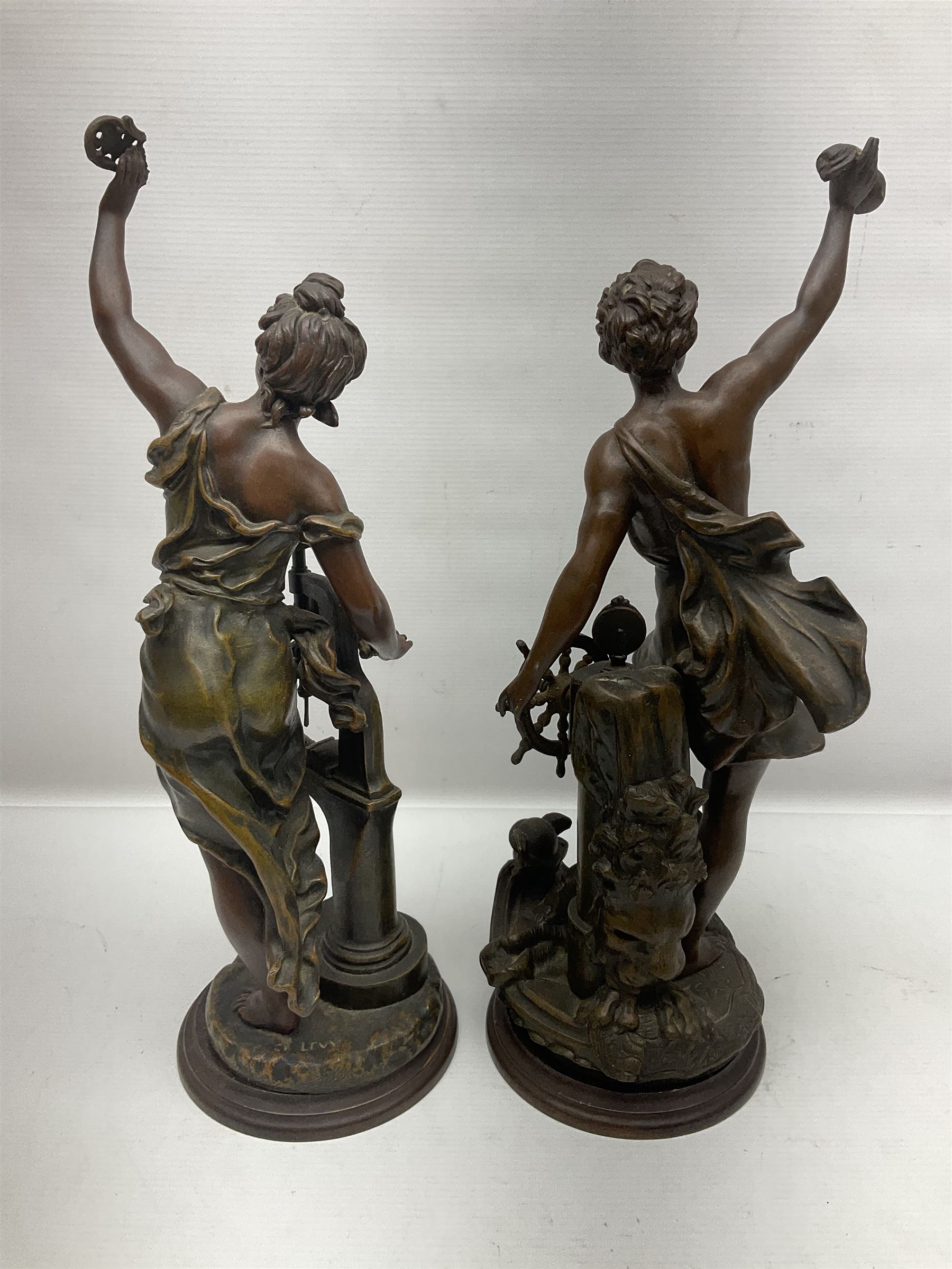 After Charles Octave Levy, pair of bronzed spelter figures, 'Industrie' and 'Commerce', upon stepped wooden plinth, H42cm