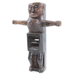 An unusual tribal carved wood figural plane, modelled as a figure with outstretched arms, L31cm