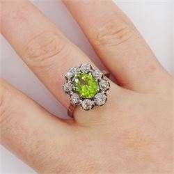 18ct white gold oval cut peridot and old cut diamond cluster ring, stamped 18ct, total diamond weight approx 1.20 carat