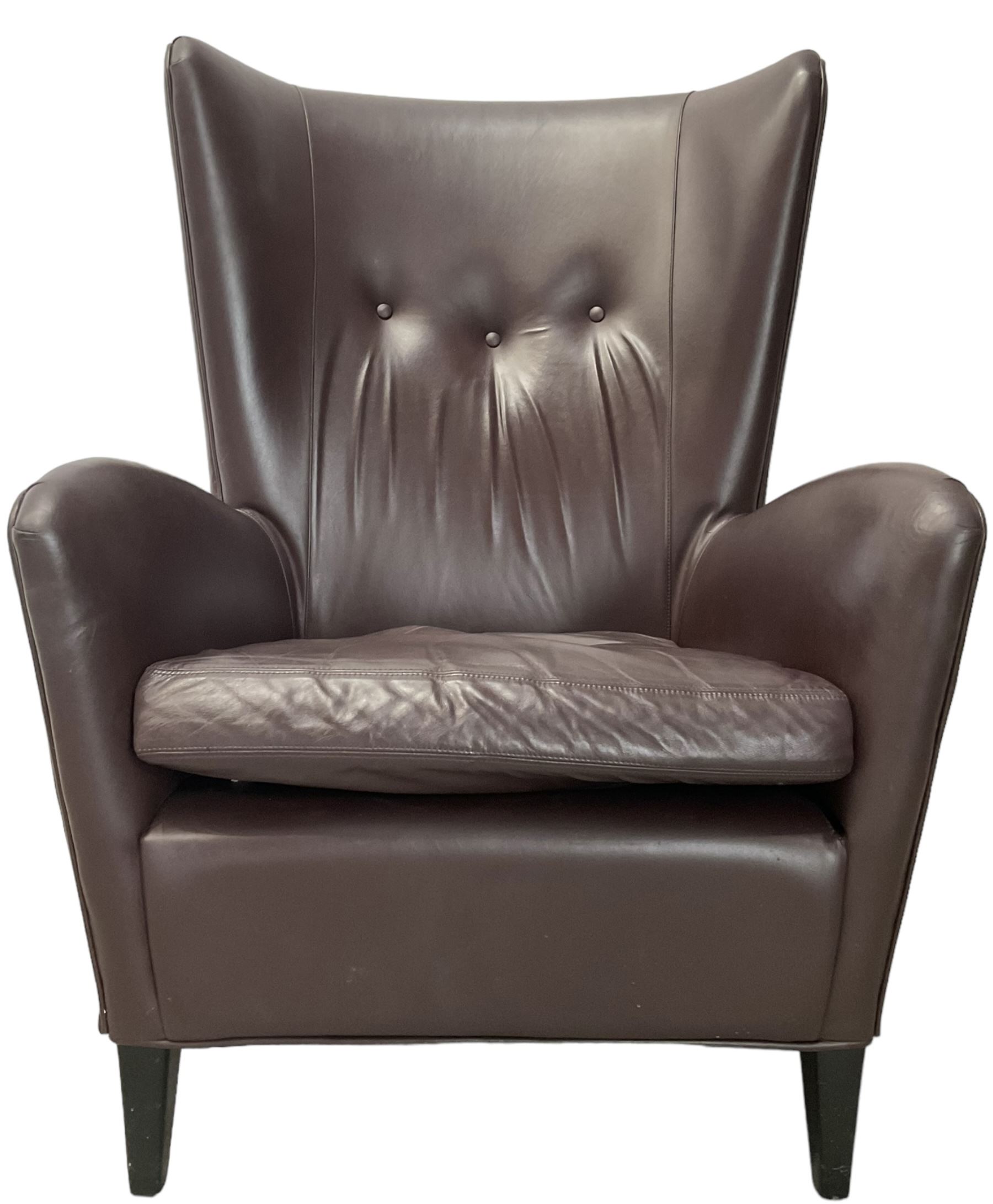 Wing back armchair upholstered in cocoa brown leather