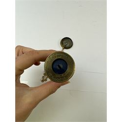 Late 19th century Watkins Exposure Meter, in cylindrical brass case, inscribed Sole Makers R. Field & Co, Birmingham, together with a 19th century brass plate camera lens