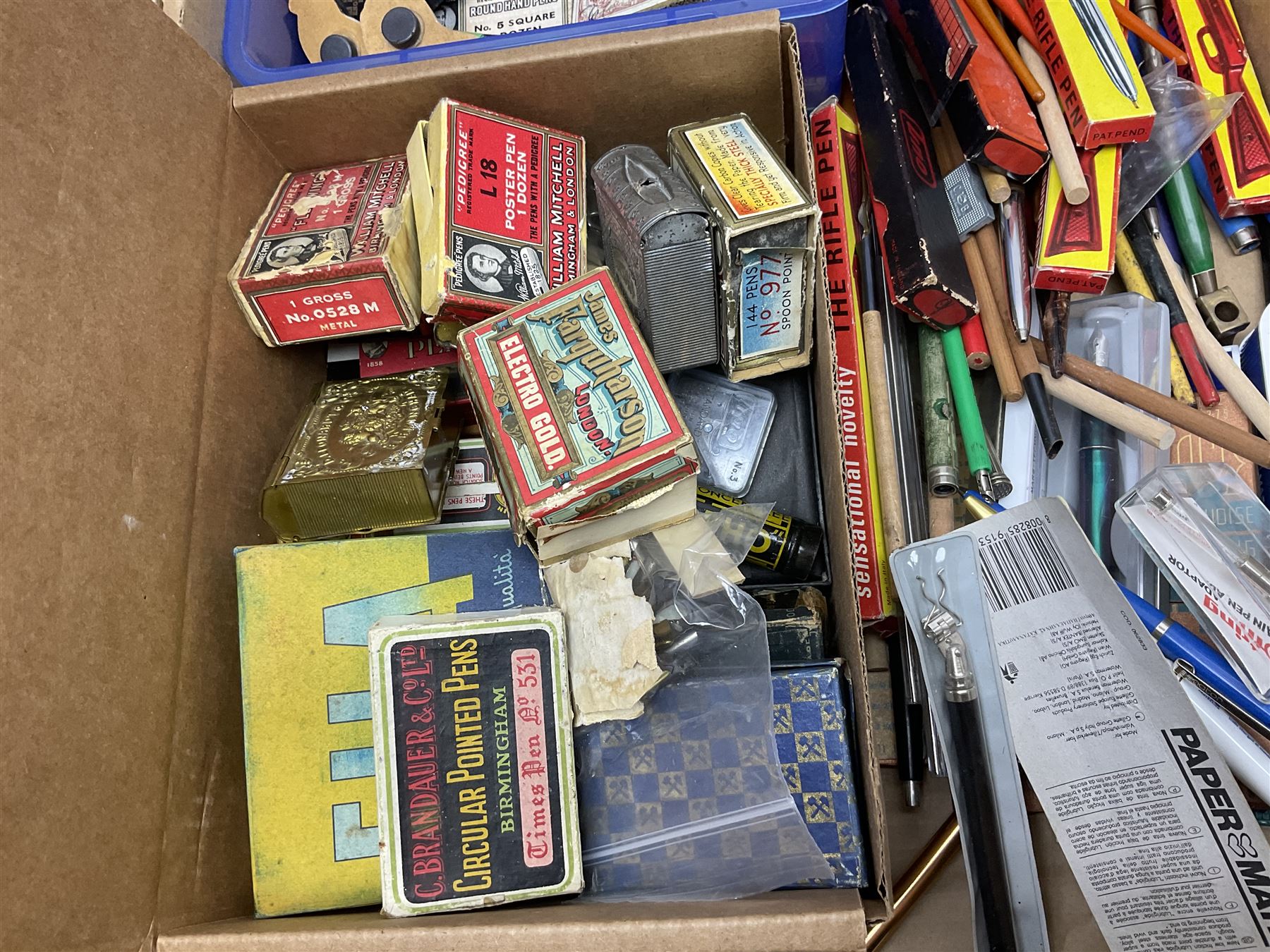 Large collection of calligraphy equipment, including pens, nibs and sets, together with other writing equipment and stationery, in three boxes