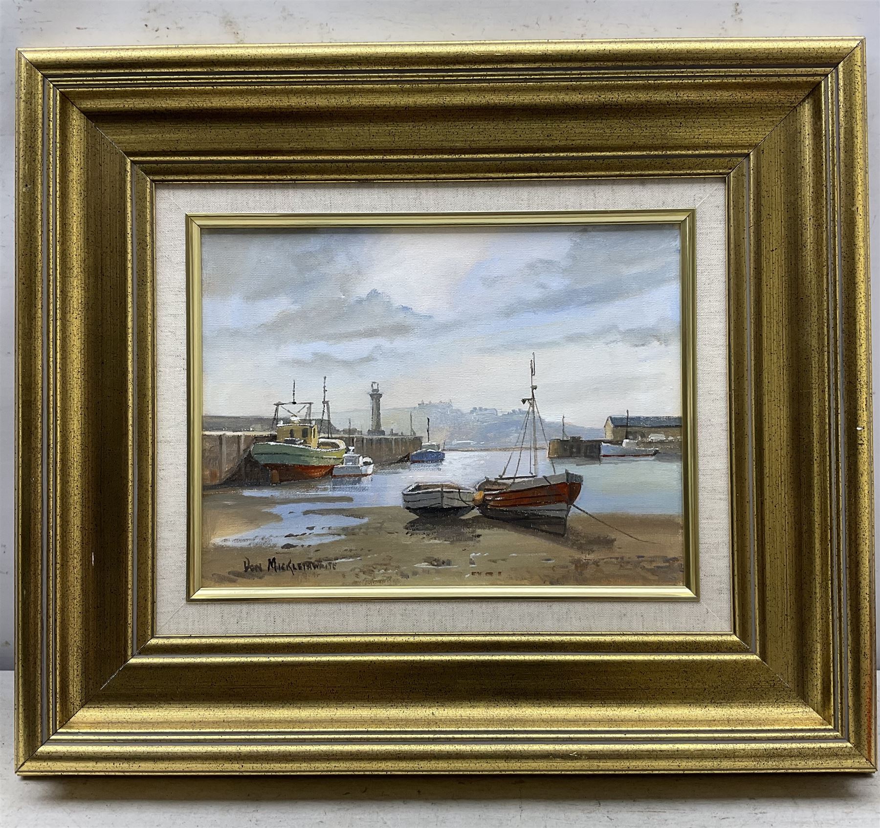 Don Micklethwaite (British 1936-):  Boats in the Harbour at Low Tide, oil on canvas signed 22cm x 29cm