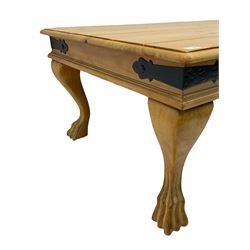 Rectangular pine coffee table, plank top with metal strapping, on paw feet