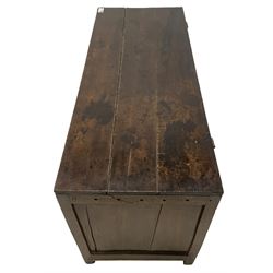 Large 18th century oak coffer or blanket box, hinged lid over triple panelled front, panelled back and sides, on stile supports 