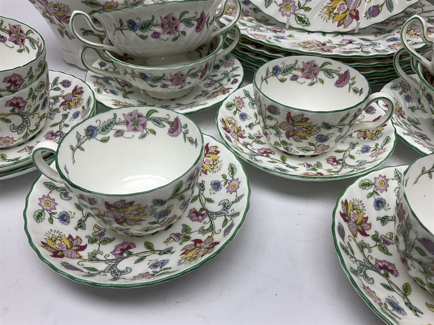 Minton Haddon Hall part tea and dinner service, including six cups and saucers, six dinner plates, six side plates, six twin handled bowls and saucers etc (44) 