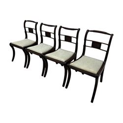 Set of four Regency mahogany dining chairs, rope twist and bead turned cresting rail over reeded middle rail, upholstered drop-in seat, reeded frame and sabre supports