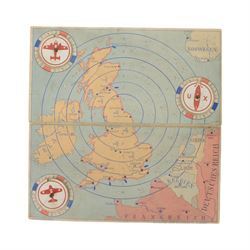 WWII German board game, Wir Kampfen gegen den Feind, Goebel Spiele, 1940, color-printed, foldable game board: British Isles with concentric distance circles, 3 rotating discs, fifteen game pieces (comprising three submarines, seven bombers and five fighter planes), in original box
