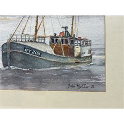 John Hotson (British 20th century): Grimsby Fishing Trawlers at Sea, watercolour signed and dated '91, 28cm x 38cm