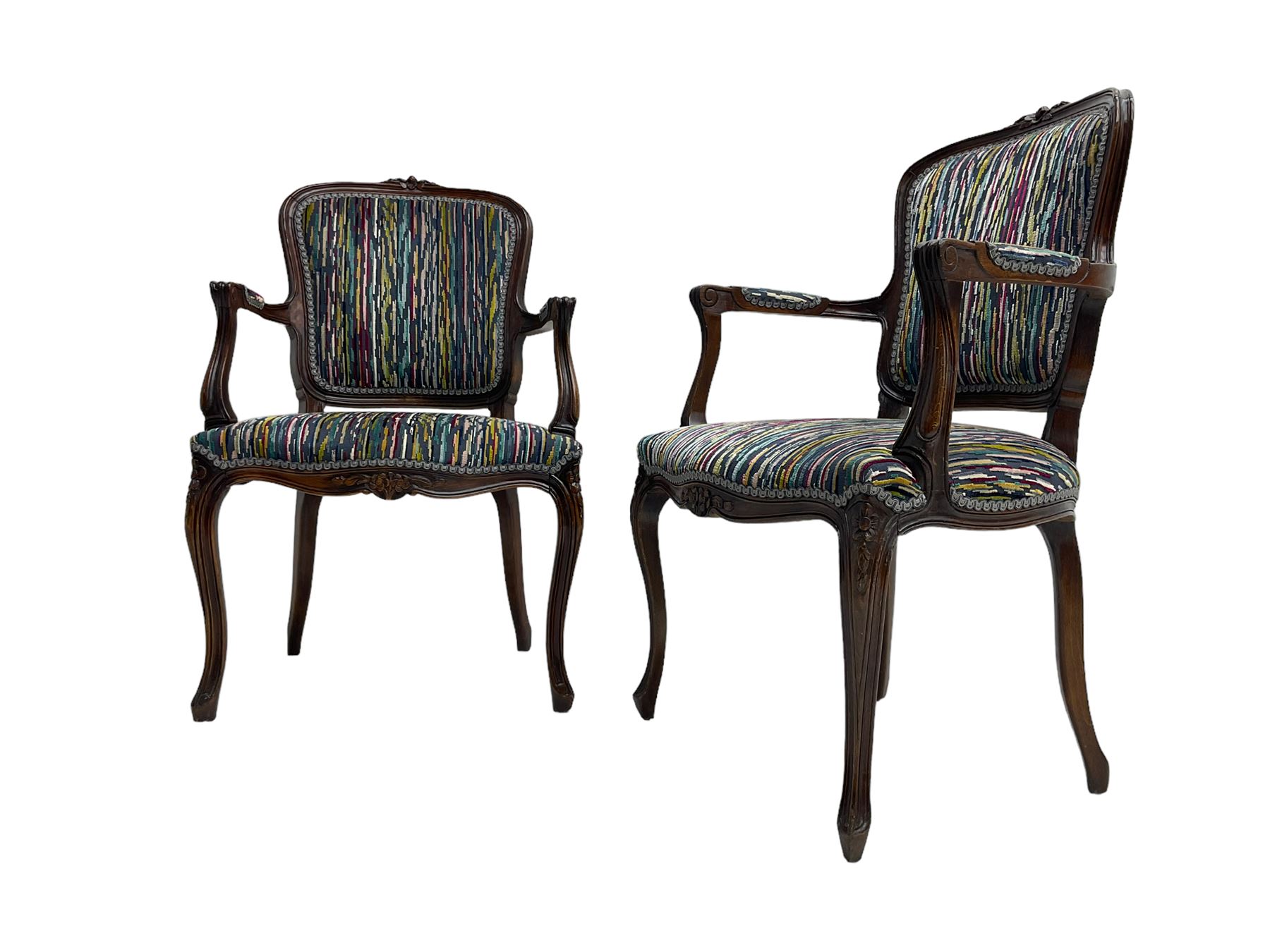 Pair of French design open armchairs, the moulded frame carved with flower heads, upholstered seat, back and arms, on cabriole supports