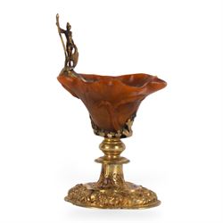 Rhinoceros horn libation cup with gilt metal mounts, probably 18th century, the cup of nat...