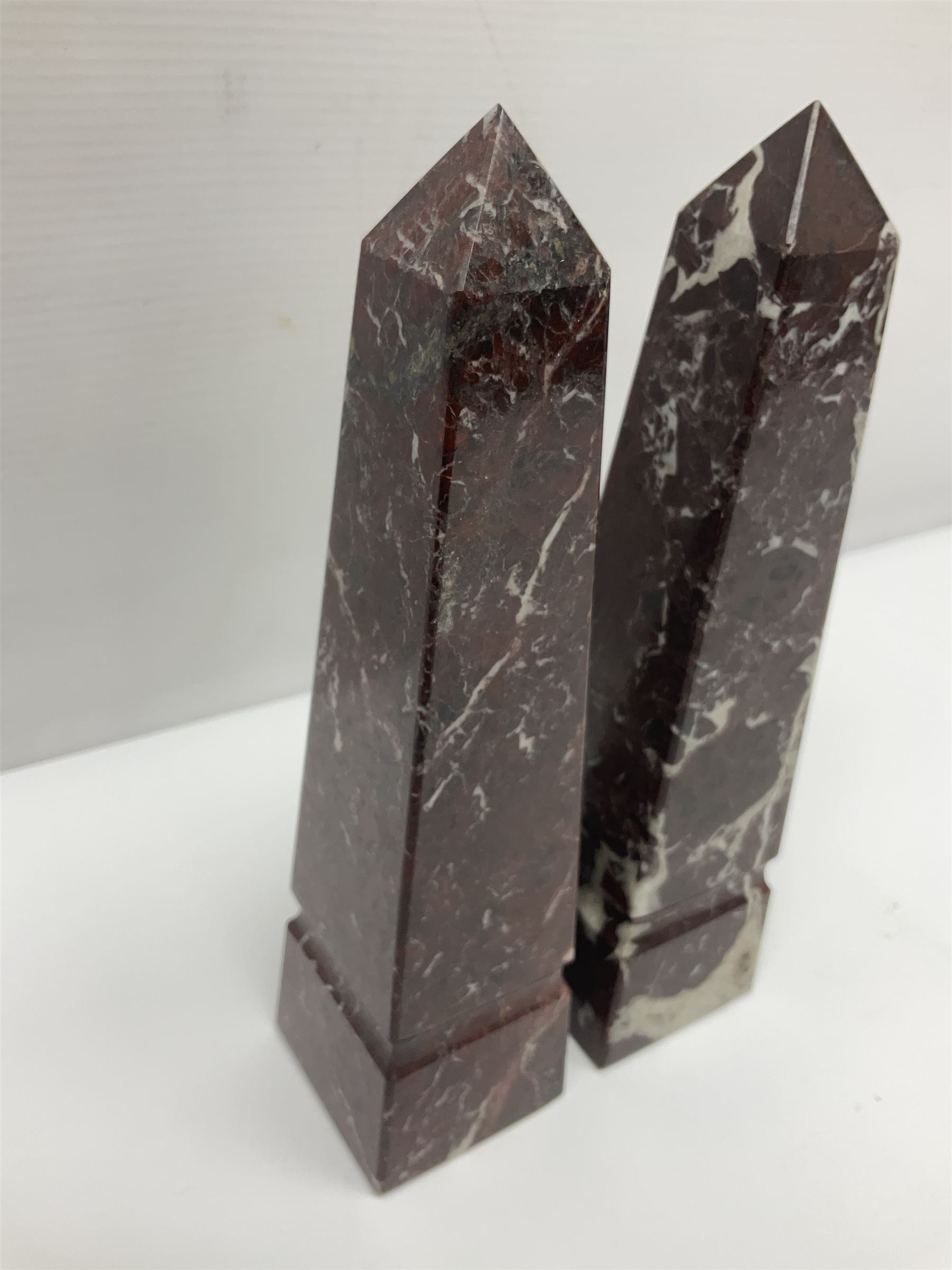 Pair of red marble obelisks H20cm