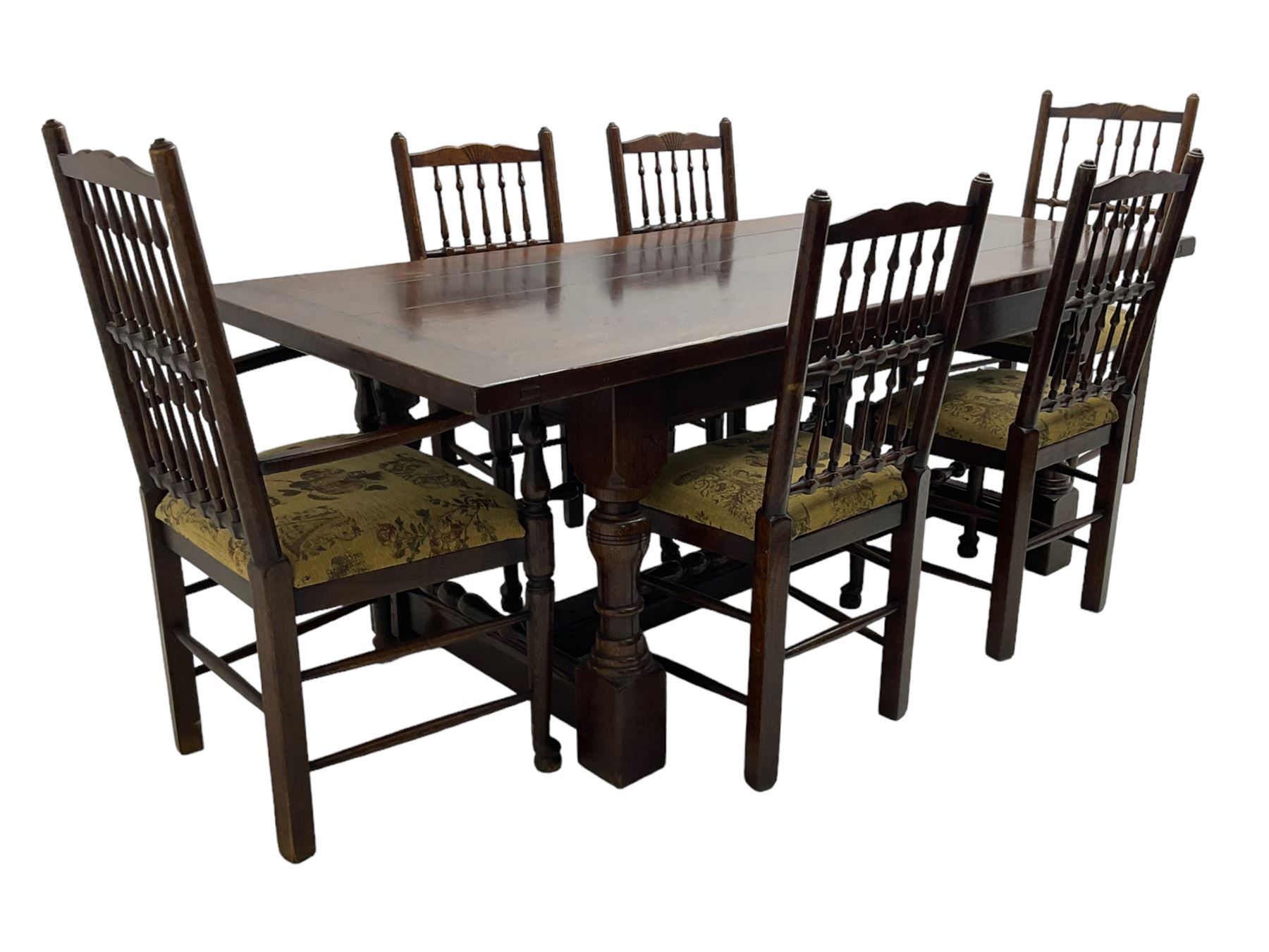 Oak refectory dining table, rectangular cleated top on turned supports joined by H-stretcher; together with set of six (4+2) oak spindle back dining chairs, with upholstered drop-on seat cushions, turned supports joined by turned stretchers