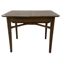 Mid-20th century teak extending dining table, rectangular top with rounded corners, raised...