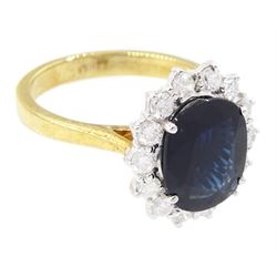 18ct gold oval cut sapphire and round brilliant cut diamond cluster ring, 