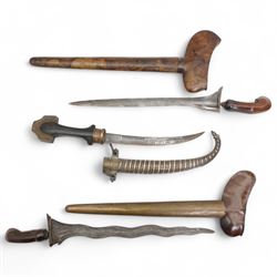 Malayan Kris with hardwood grip and scabbard, another and a Middle Eastern jambiya with de...