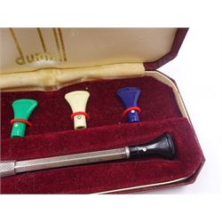 Mid 20th century silver cigarette holder, with engine turned decoration and multicoloured interchangeable mouthpieces, hallmarked Alfred Dunhill & Sons, Birmingham 1965, contained within fitted Dunhill case