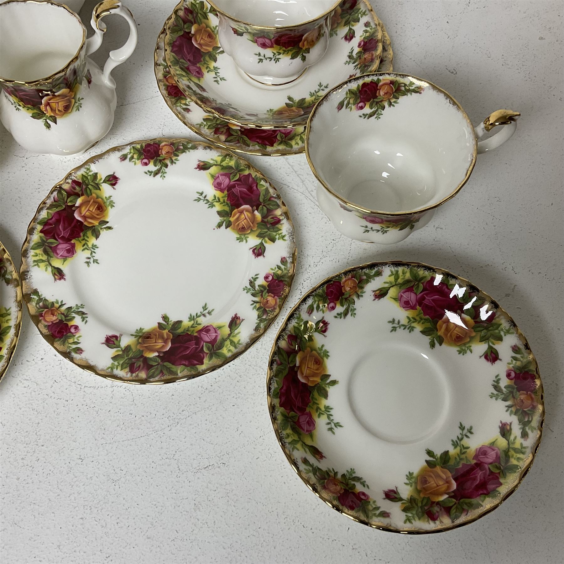 Royal Albert Old Country Roses pattern, tea service for six, comprising teapot, milk jug, open sucrier, dessert plates, teacups and saucers