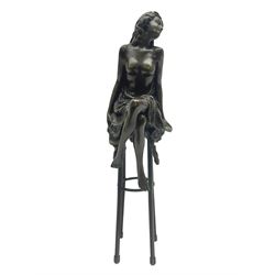 Art Deco style bronze modelled as a semi naked female figure, seated upon a chair, after 'Pierre Collinet', H27cm