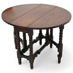 Small 17th century design oak drop-leaf, table oval top over bobbin-turned gate-leg supports, united by stretchers