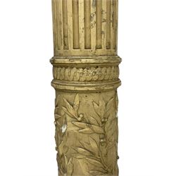 Three 19th century wood and gesso Composite order architectural architraves - curled acanthus leaf capitals over fluted shafts, the bases decorated with guilloche moulding over trailing laurel leaf branches, one half columns, one L-shaped rectangular pilaster and one full column, the largest - H204cm